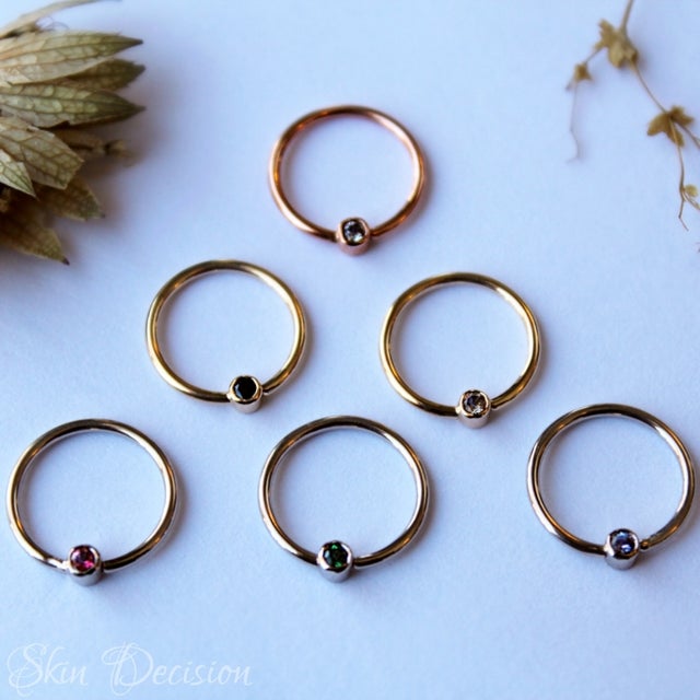 Fixed captive sales bead ring